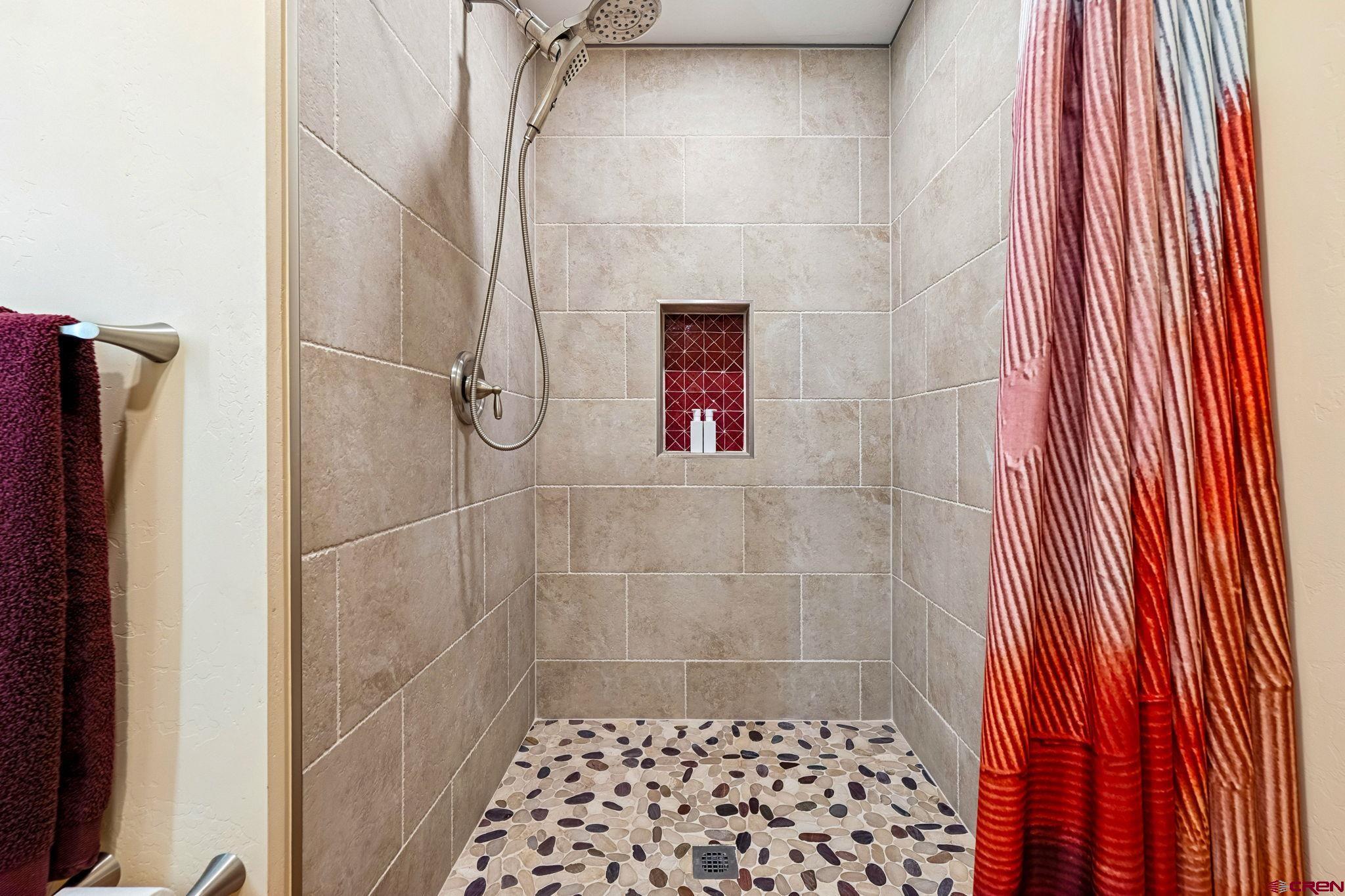 67 Gleneagles Drive Durango, CO 81301 - Photo 30 of 43 a bathroom with a shower