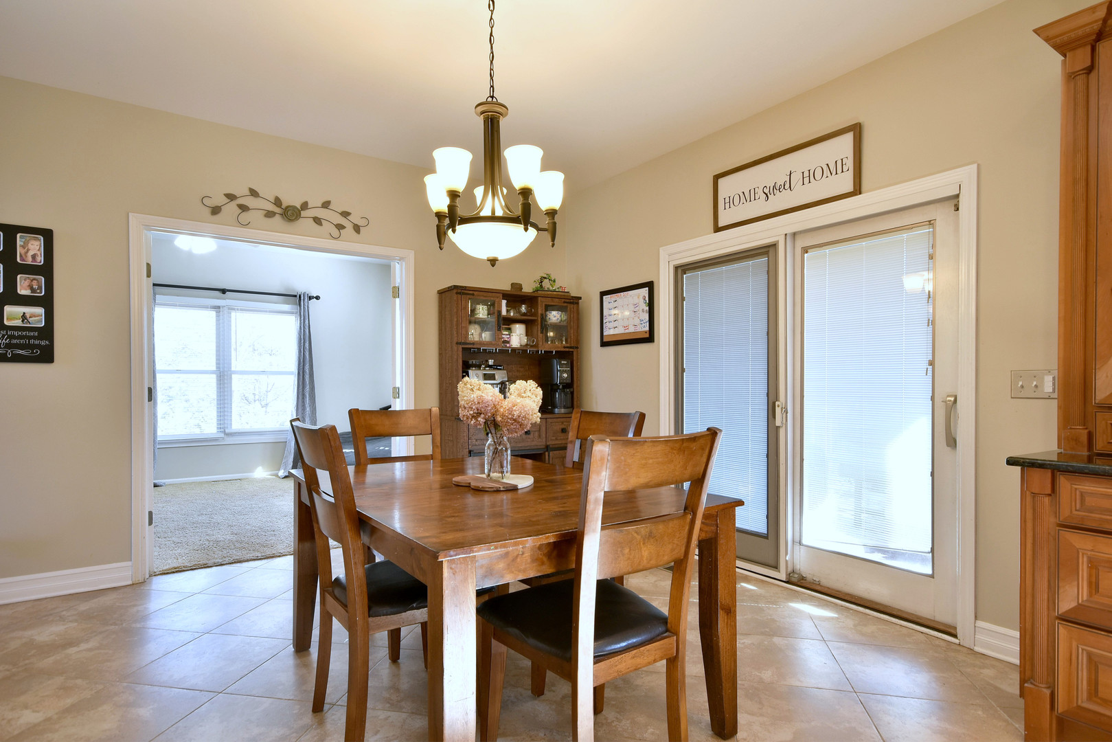 781 Hayrack Drive Algonquin, IL 60102 - Photo 13 of 54 a view of a dining room with furniture window and wooden floor