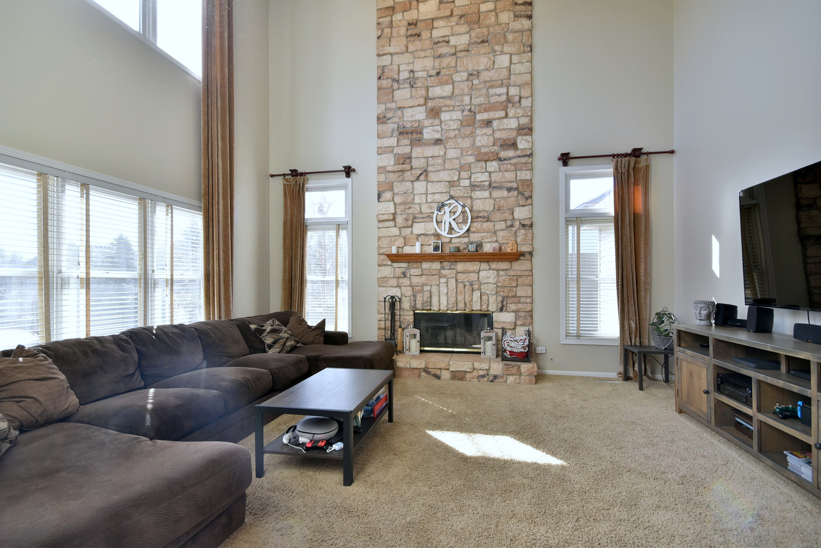 781 Hayrack Drive Algonquin, IL 60102 - Photo 16 of 54 a living room with furniture large window and a fireplace
