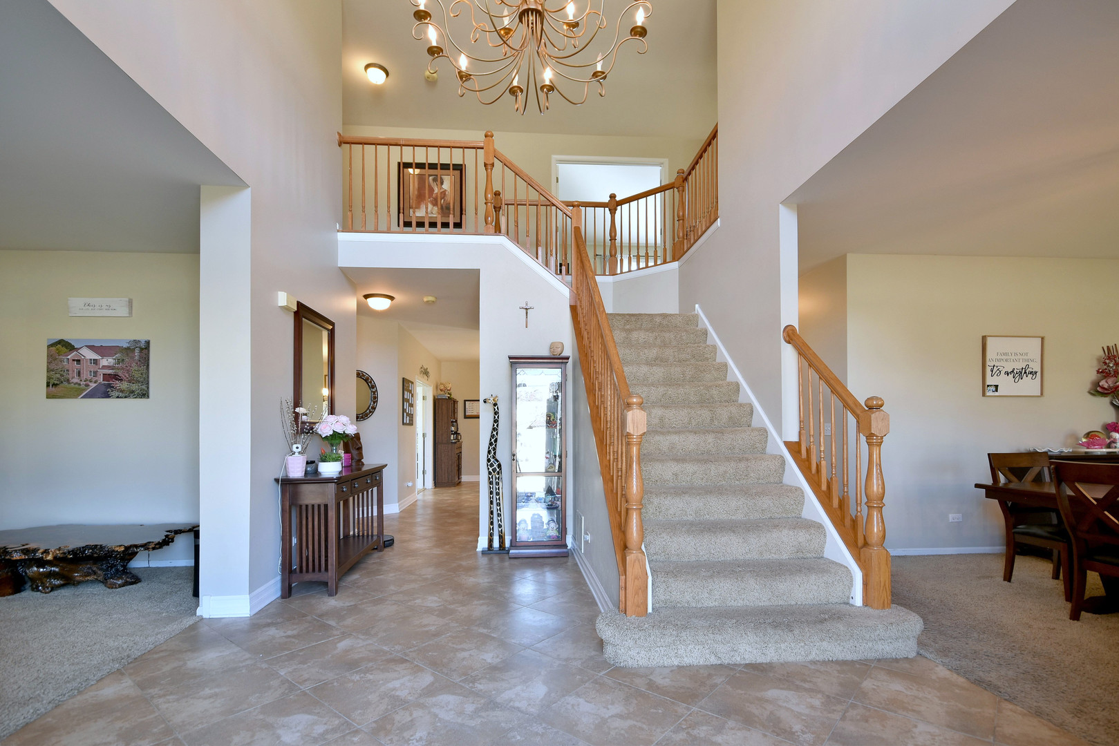 781 Hayrack Drive Algonquin, IL 60102 - Photo 2 of 54 a view of a livingroom with furniture and staircase