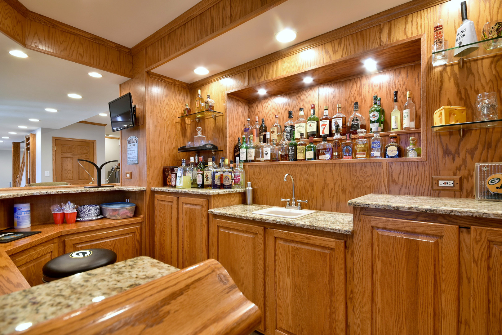 781 Hayrack Drive Algonquin, IL 60102 - Photo 38 of 54 a kitchen with a sink a stove and cabinets