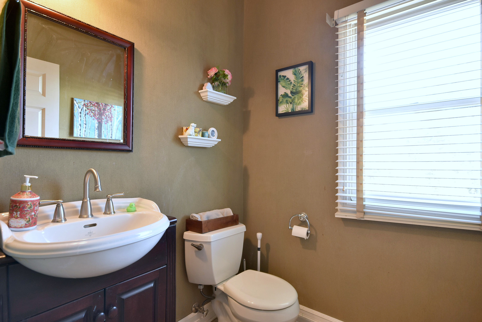 781 Hayrack Drive Algonquin, IL 60102 - Photo 8 of 54 a bathroom with a sink a mirror and a toilet