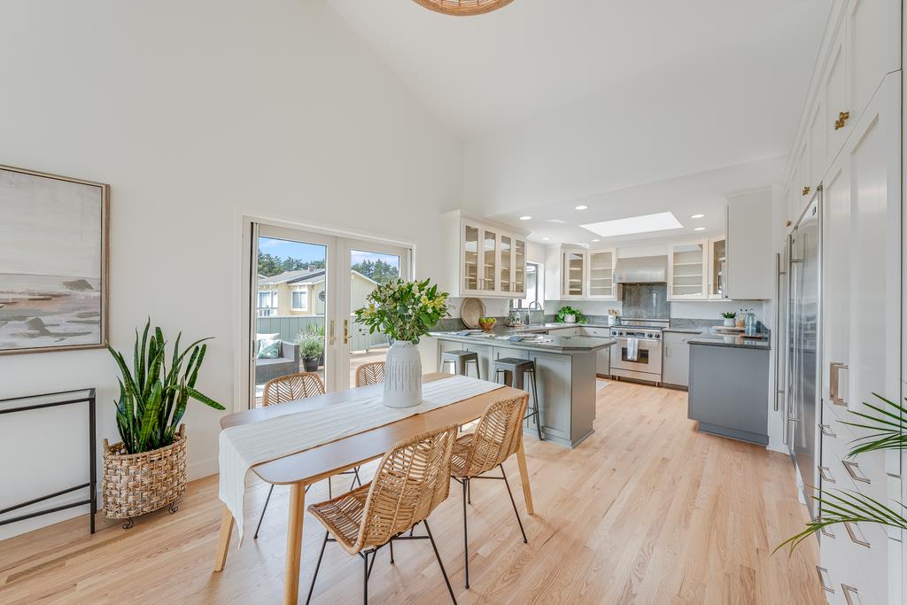 117 El Camino Del Mar Aptos, CA 95003 - Photo 12 of 60 a kitchen with a table and chairs
