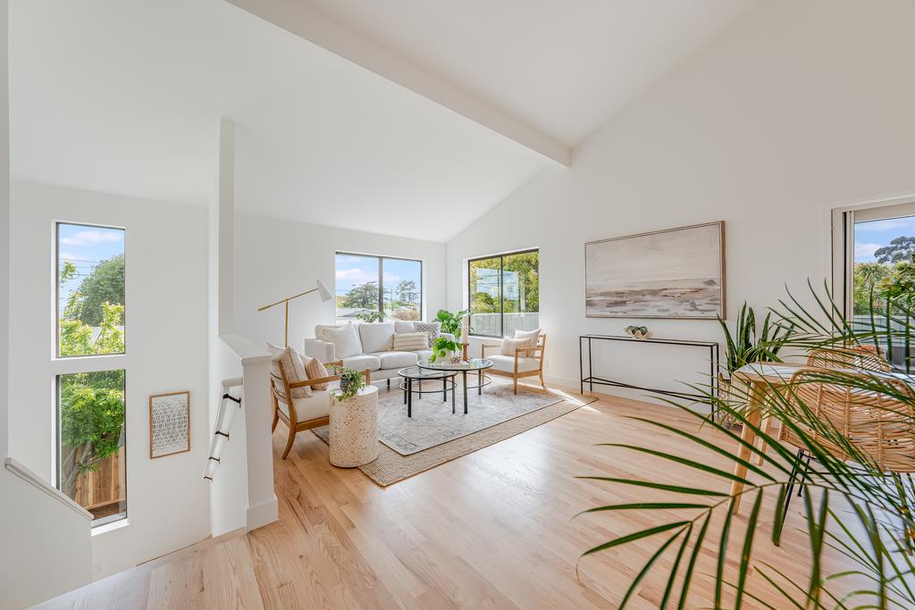 117 El Camino Del Mar Aptos, CA 95003 - Photo 2 of 60 a living room with furniture and a wooden floor
