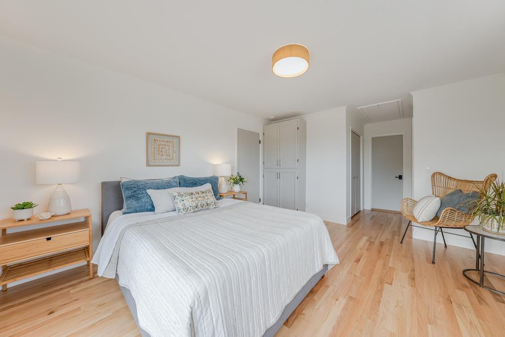 117 El Camino Del Mar Aptos, CA 95003 - Photo 28 of 60 a bed room with a bed and a chair