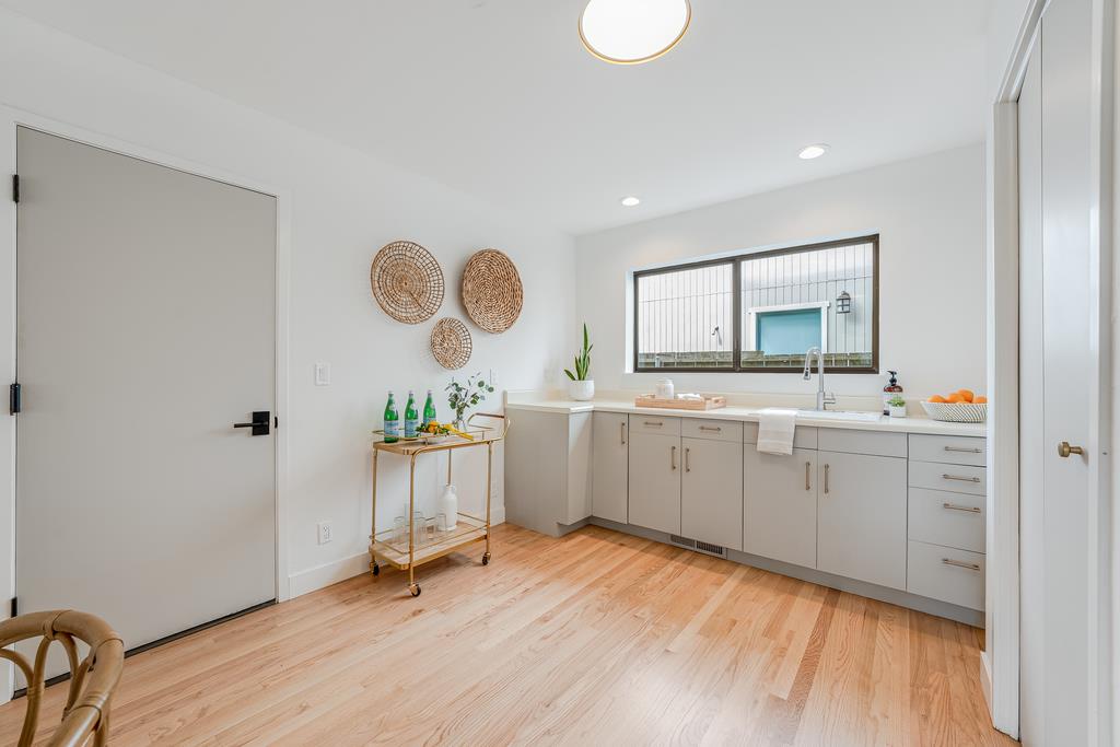 117 El Camino Del Mar Aptos, CA 95003 - Photo 41 of 60 a room with a sink mirror and a window