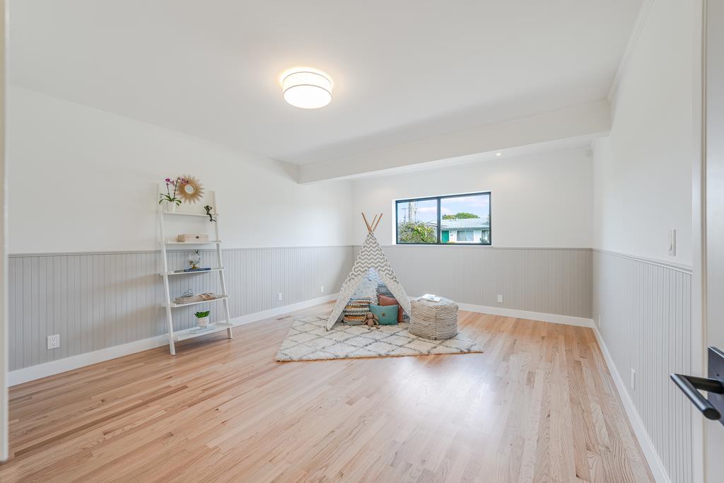 117 El Camino Del Mar Aptos, CA 95003 - Photo 43 of 60 a view of a livingroom with wooden floor and closet