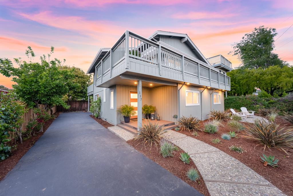 117 El Camino Del Mar Aptos, CA 95003 - Photo 50 of 60 a front view of house with yard and trees in the background