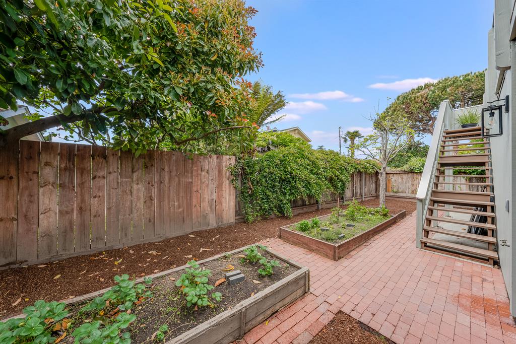117 El Camino Del Mar Aptos, CA 95003 - Photo 55 of 60 a backyard of a house with lots of green space