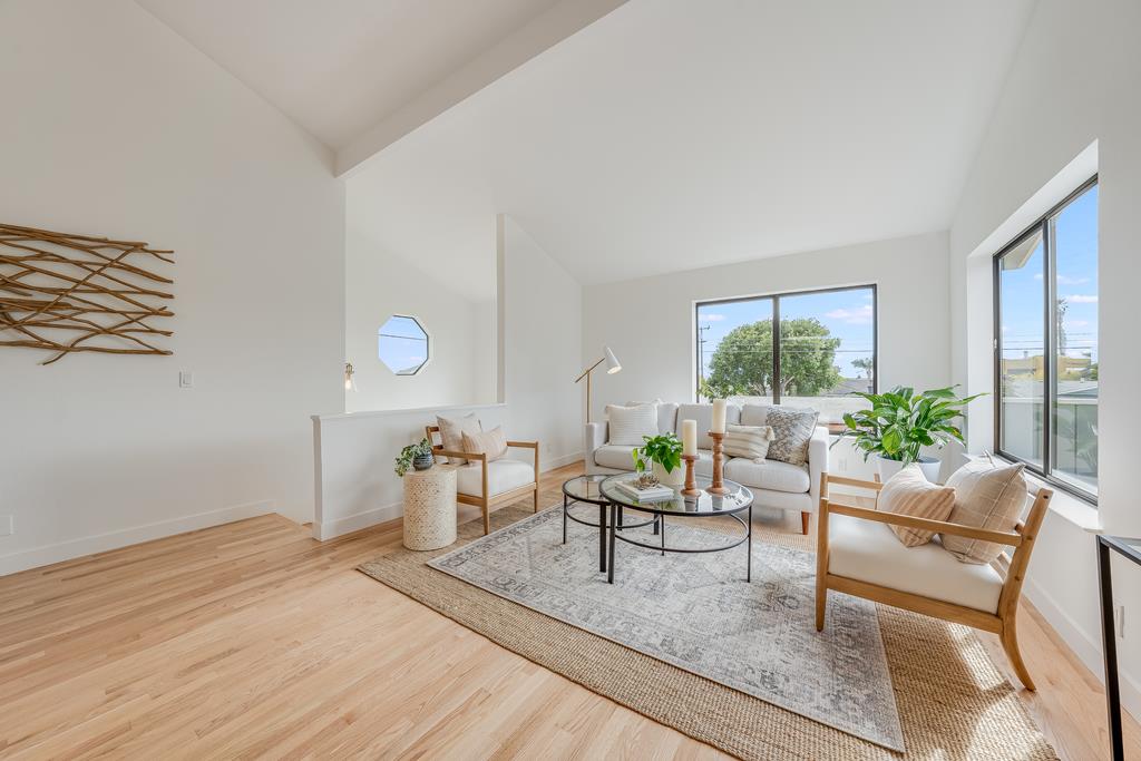 117 El Camino Del Mar Aptos, CA 95003 - Photo 10 of 60 a living room with furniture and a window
