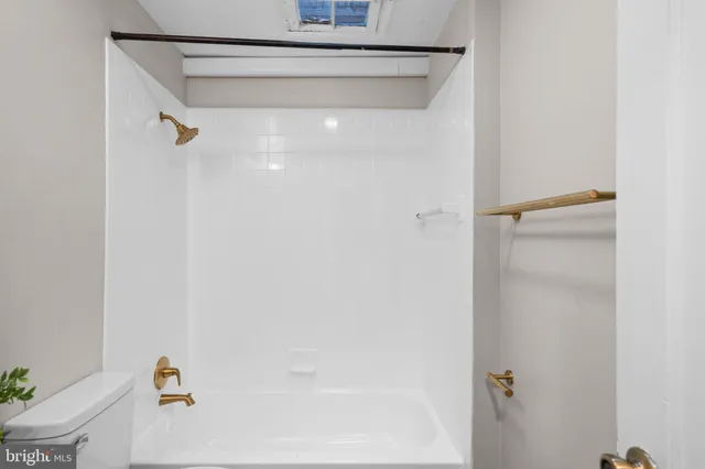 a bathroom with a bathtub