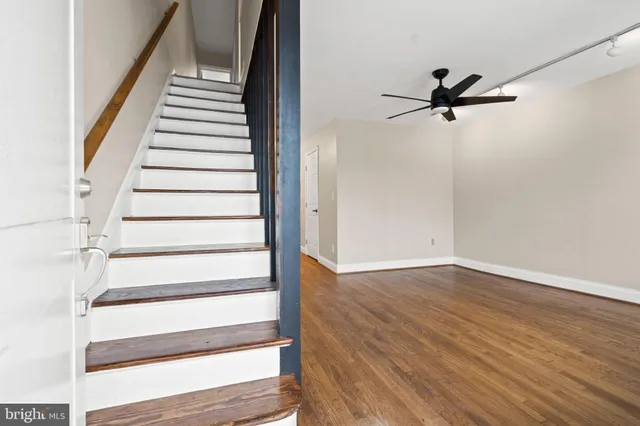 a view of entryway with wooden floor