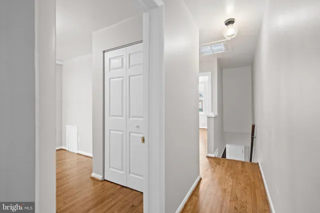 a view of a bedroom from the hallway