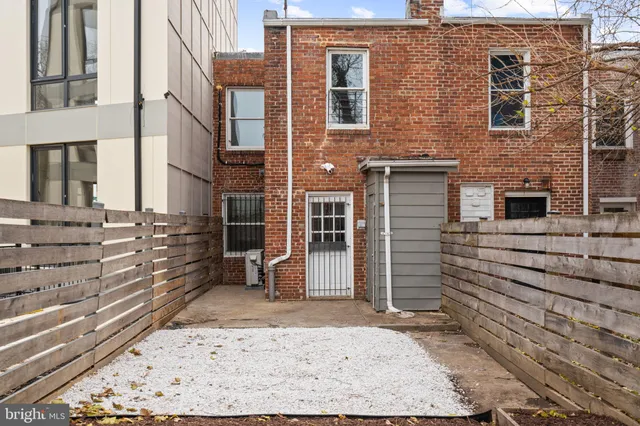 a view of a pathway with a house