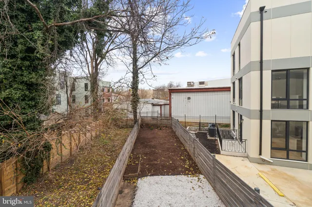 a view of a balcony with wooden floor