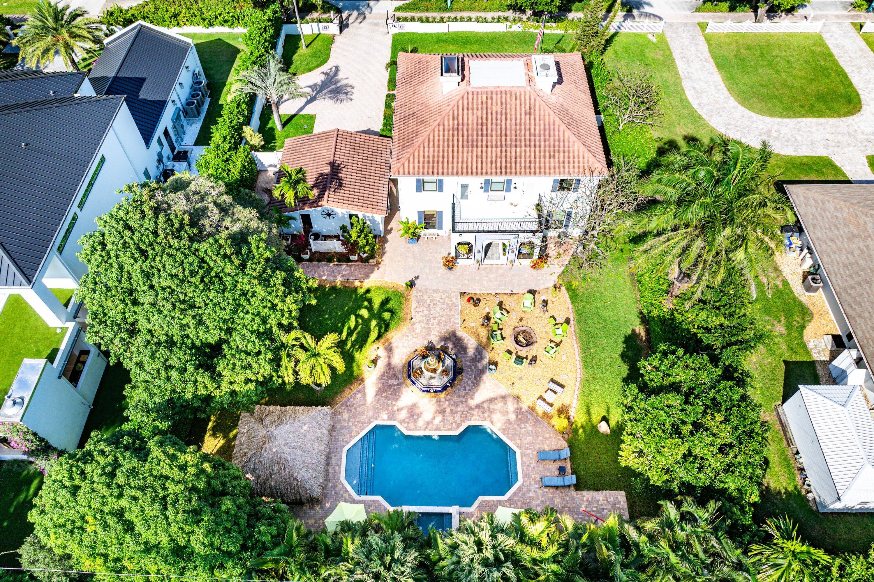 19 East Ocean Avenue Ocean Ridge, FL 33435 - Photo 22 of 24 an aerial view of a house with a yard and lake view