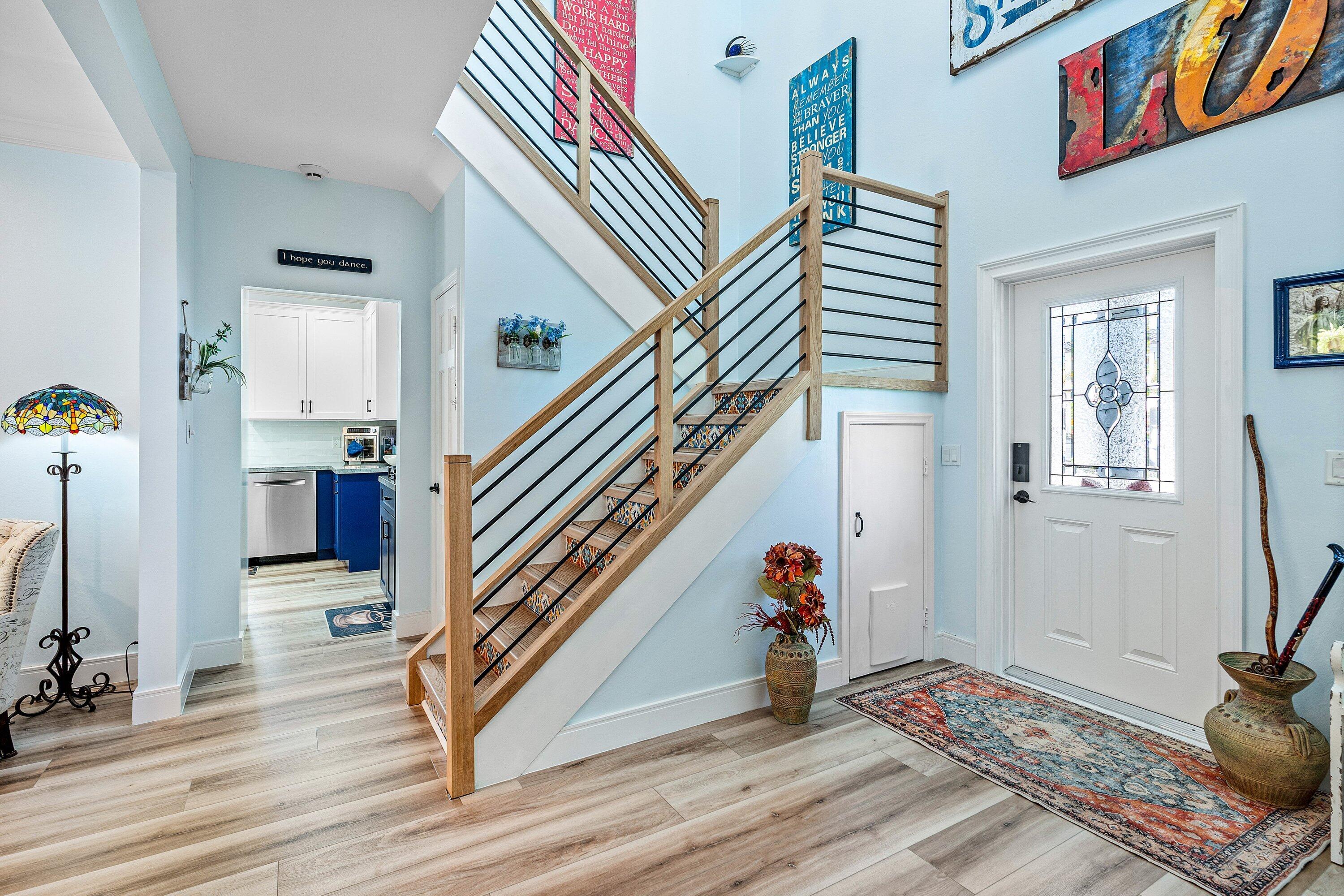 19 East Ocean Avenue Ocean Ridge, FL 33435 - Photo 4 of 24 a view of entryway and hall with wooden floor
