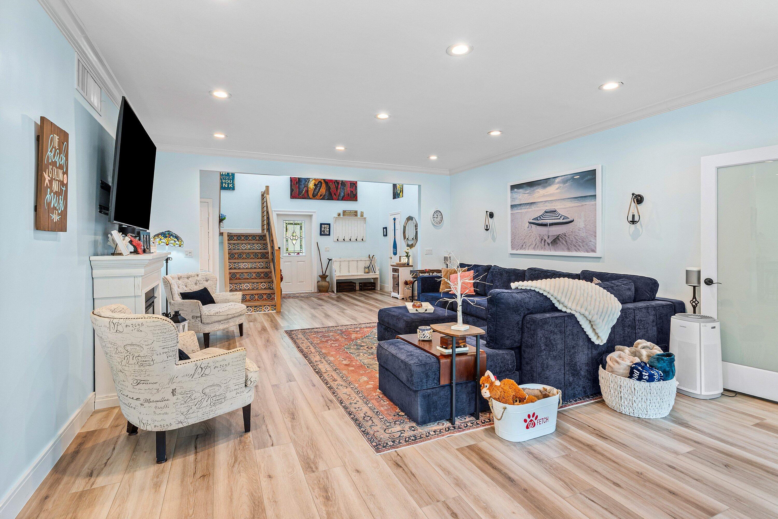 19 East Ocean Avenue Ocean Ridge, FL 33435 - Photo 6 of 24 a living room with furniture and wooden floor