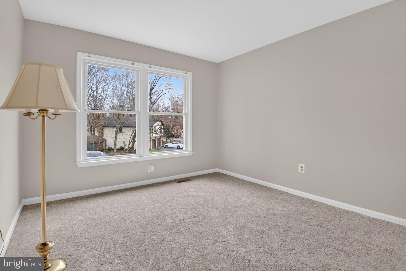 7140 Hamor Lane Springfield, VA 22153 - Photo 16 of 29 an empty room with windows and closet