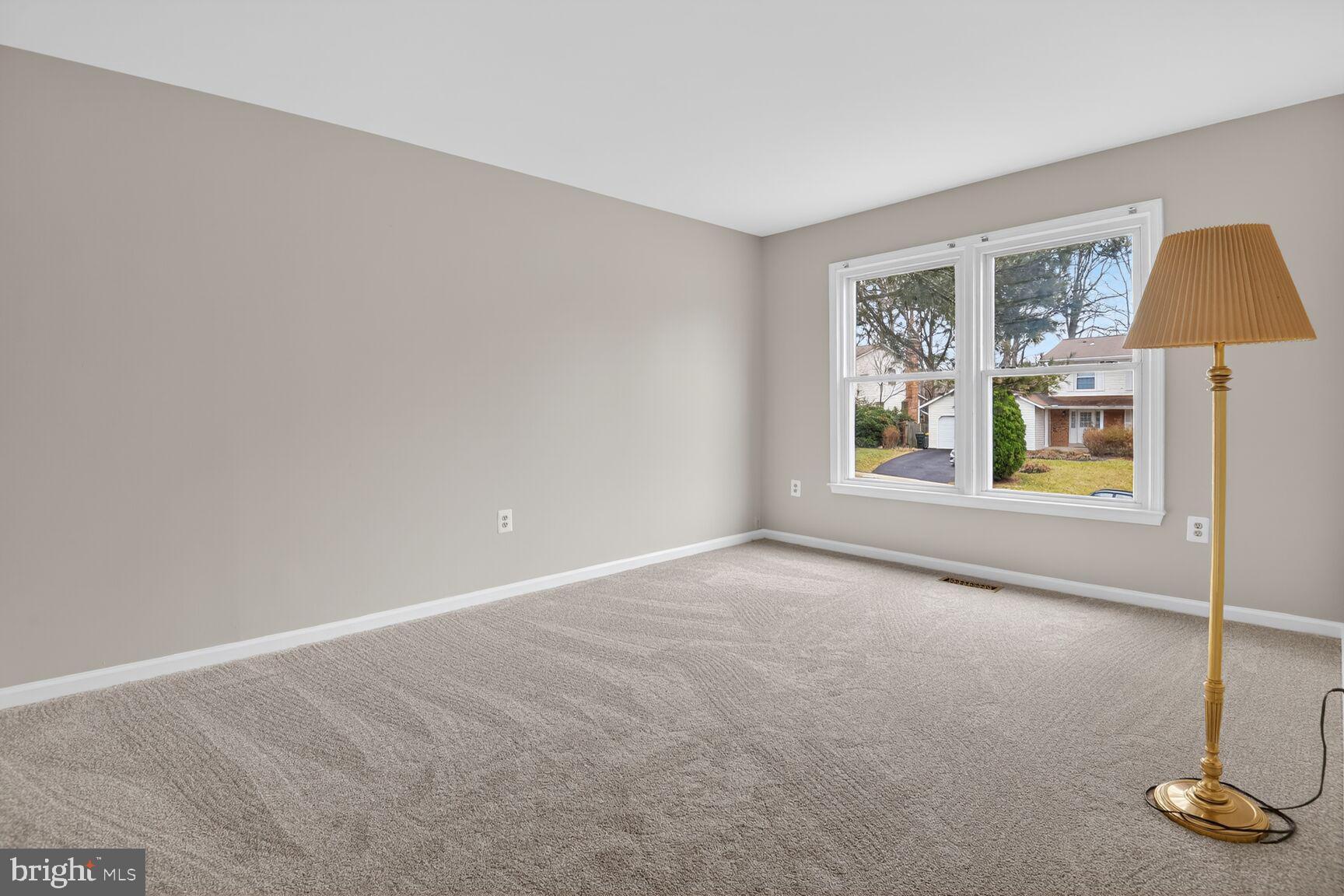 7140 Hamor Lane Springfield, VA 22153 - Photo 17 of 29 a view of an empty room with a window