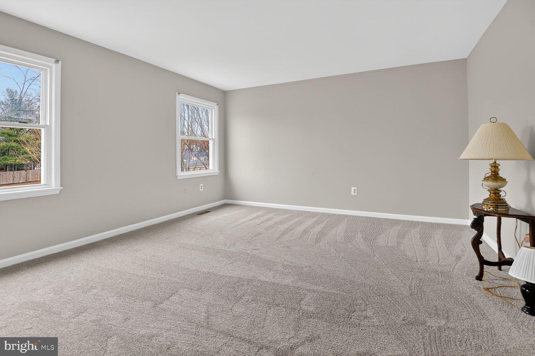 7140 Hamor Lane Springfield, VA 22153 - Photo 18 of 29 a view of an empty room with a window
