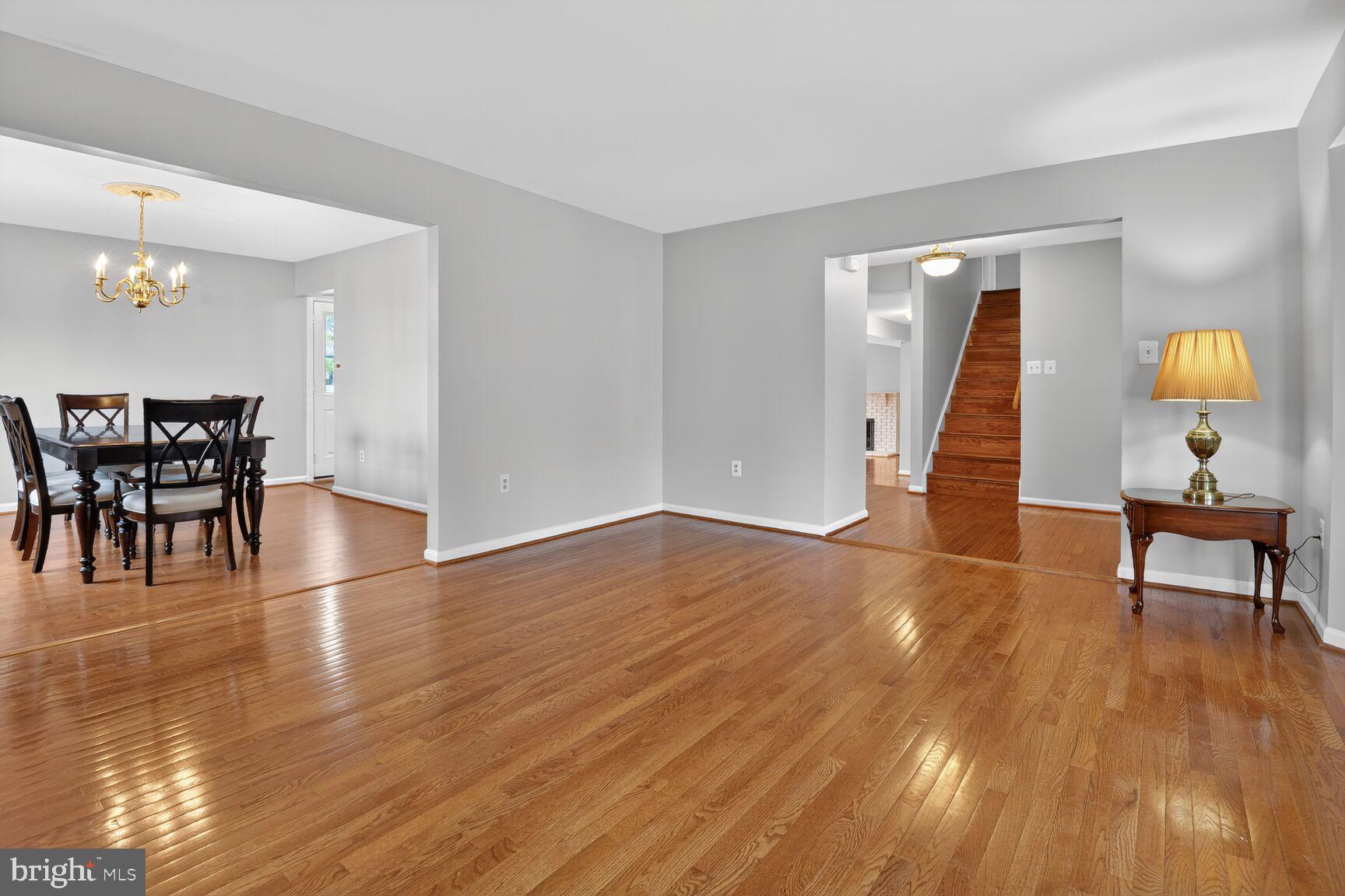 7140 Hamor Lane Springfield, VA 22153 - Photo 5 of 29 a view of a livingroom with furniture and wooden floor