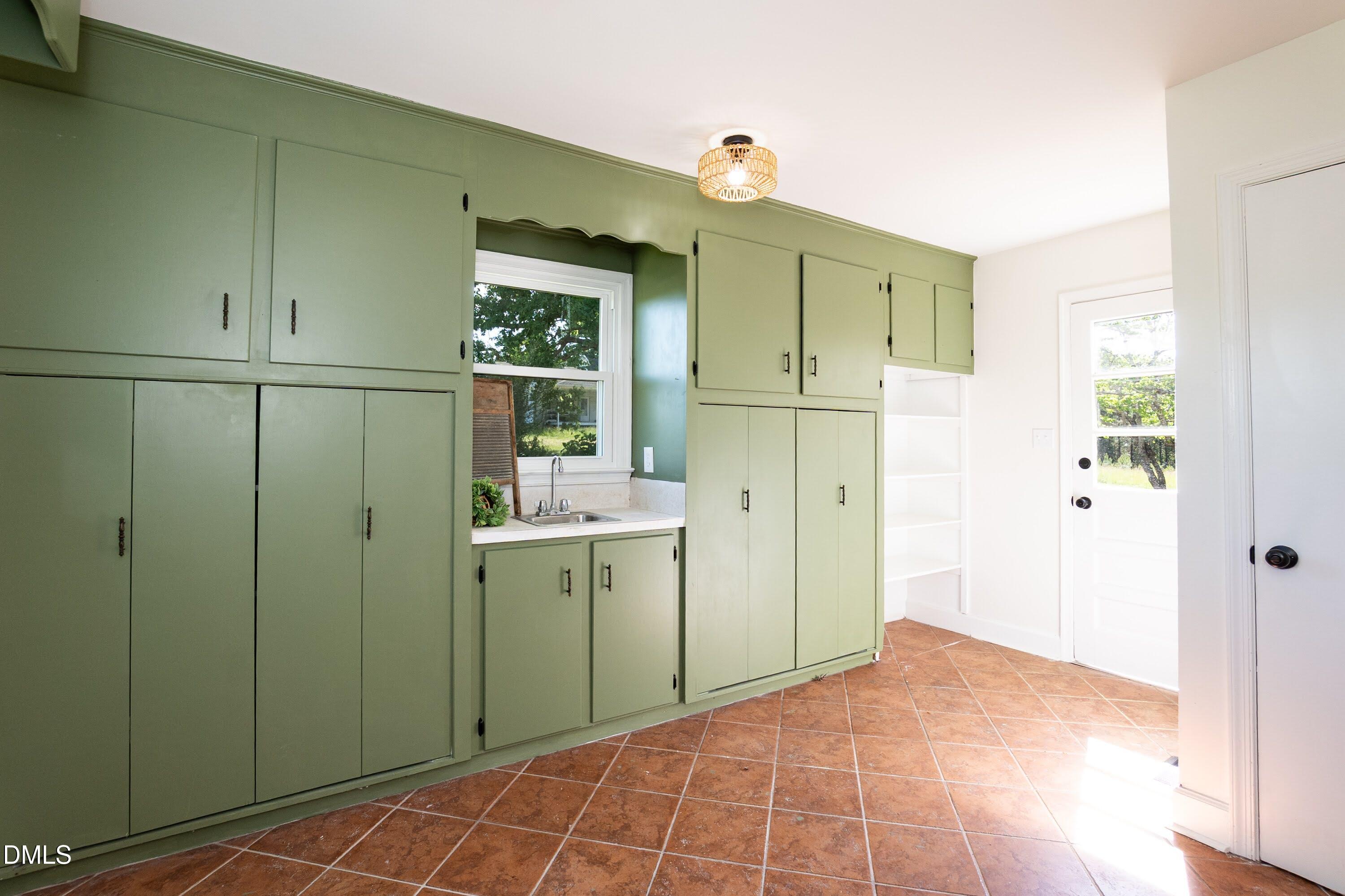 641 Rocky Ford Road Louisburg, NC 27549 - Photo 24 of 38 a view of a kitchen from the hallway