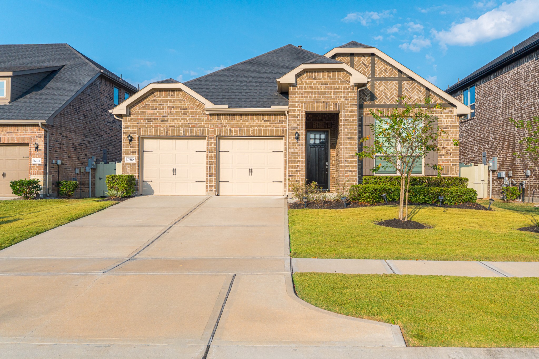17310 Autumn Sage Court Conroe, TX 77385 - Photo 1 of 31 a front view of a house with a yard