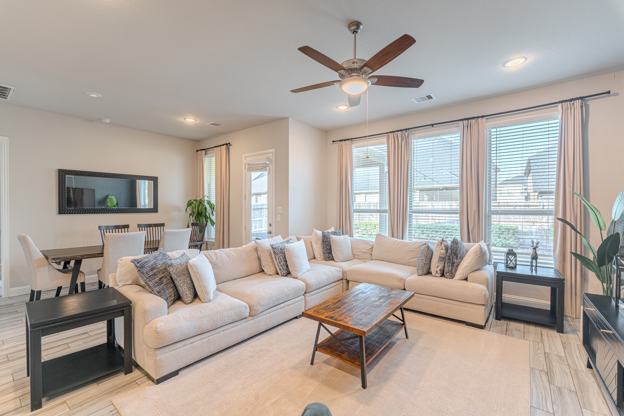 17310 Autumn Sage Court Conroe, TX 77385 - Photo 14 of 31 a living room with furniture and a large window