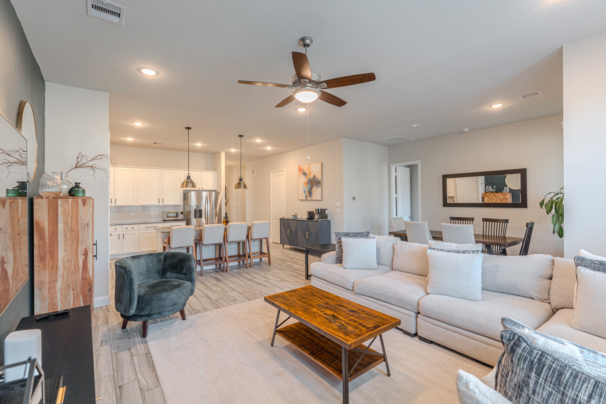 17310 Autumn Sage Court Conroe, TX 77385 - Photo 15 of 31 a living room with furniture and a ceiling fan