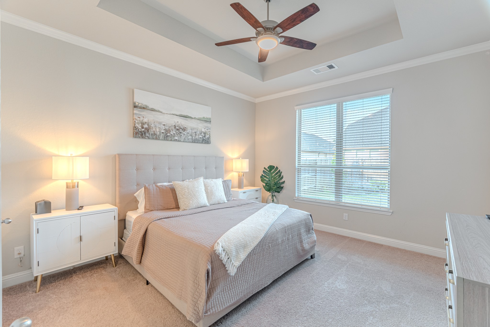 17310 Autumn Sage Court Conroe, TX 77385 - Photo 18 of 31 a bedroom with a bed and a window