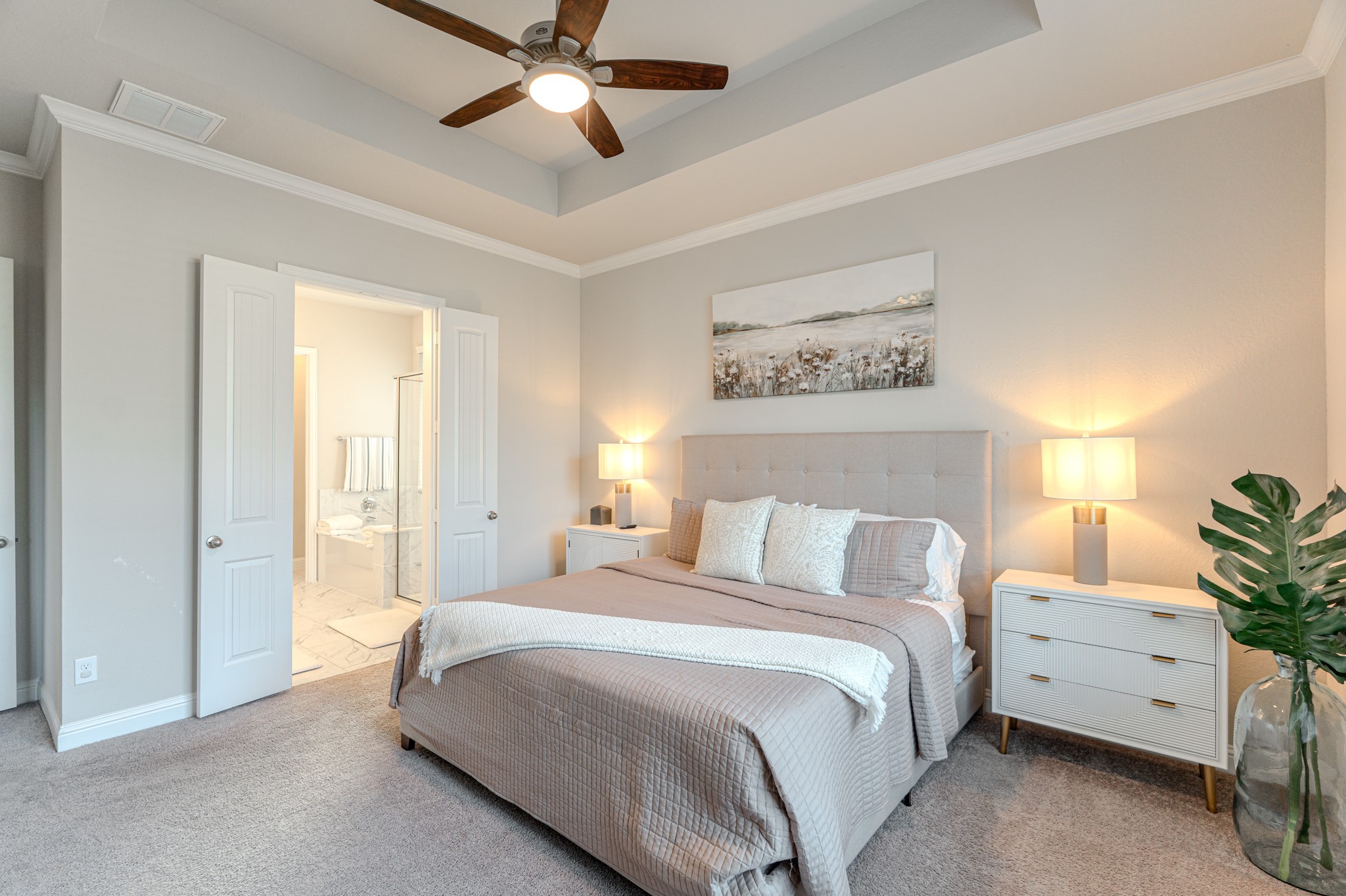17310 Autumn Sage Court Conroe, TX 77385 - Photo 19 of 31 a spacious bedroom with a bed and a window