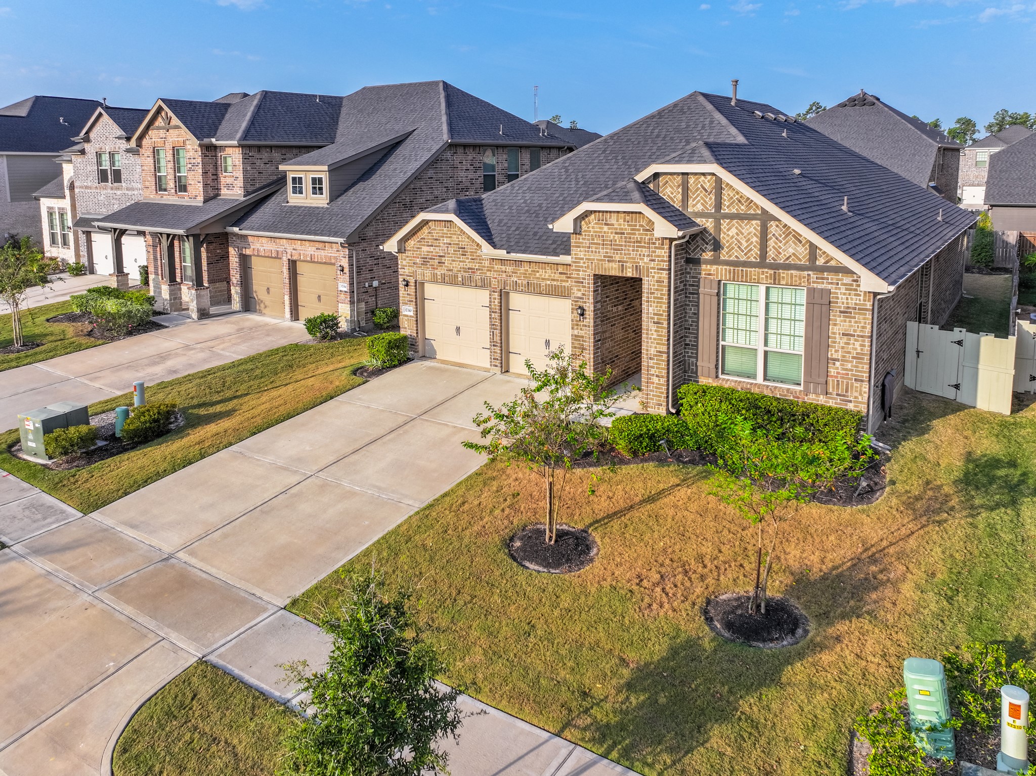 17310 Autumn Sage Court Conroe, TX 77385 - Photo 2 of 31 a front view of a house with a yard