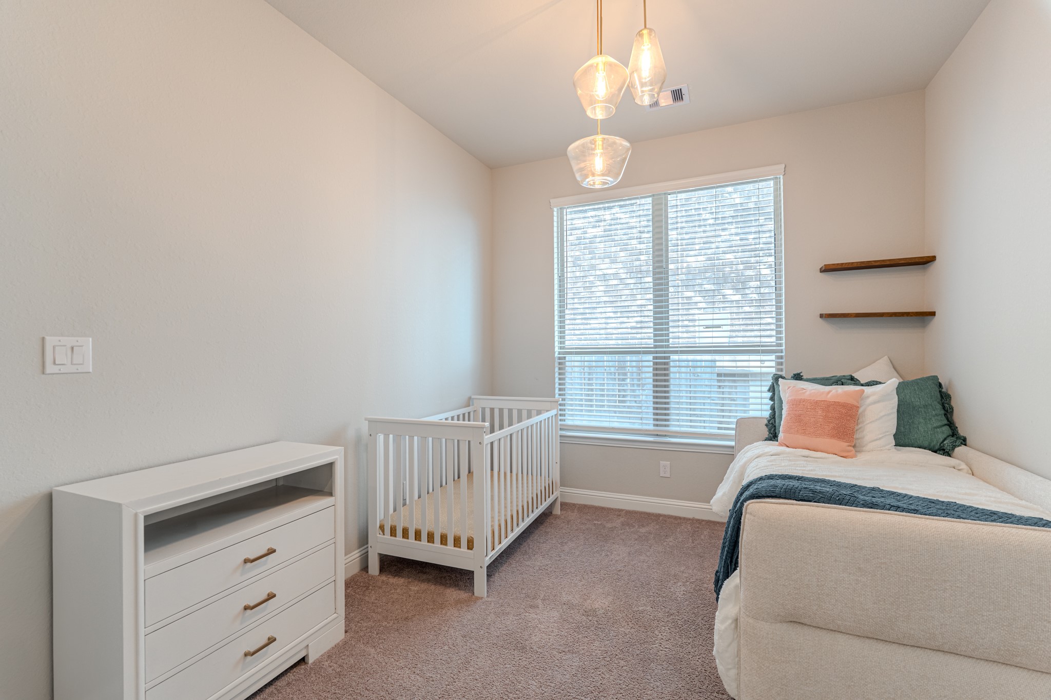 17310 Autumn Sage Court Conroe, TX 77385 - Photo 23 of 31 a bedroom with a bed and a window