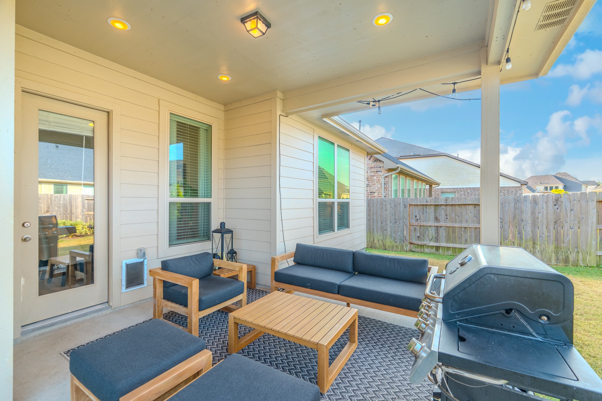 17310 Autumn Sage Court Conroe, TX 77385 - Photo 30 of 31 a living room with furniture and a window