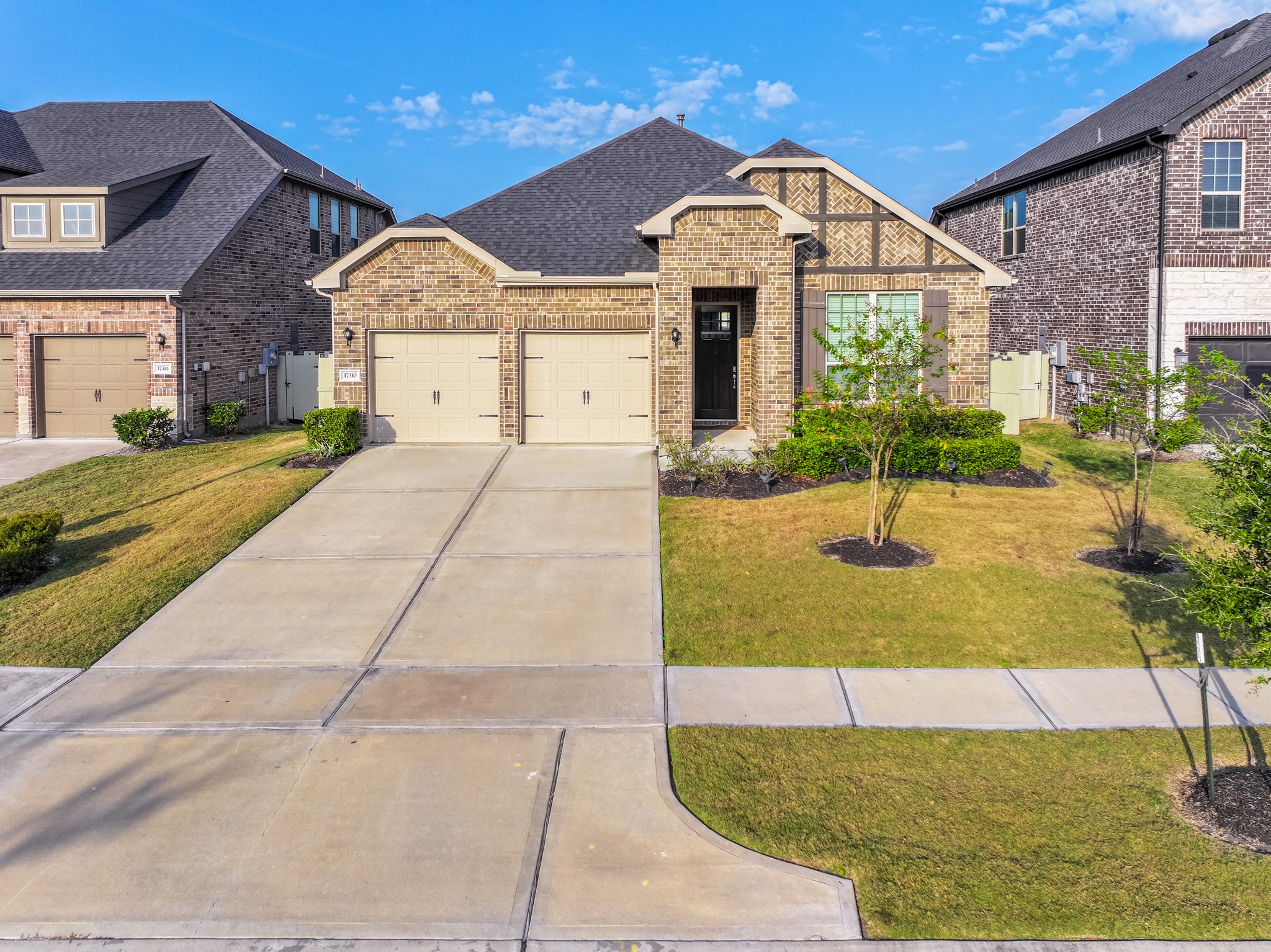 17310 Autumn Sage Court Conroe, TX 77385 - Photo 5 of 31 a front view of a house with a yard