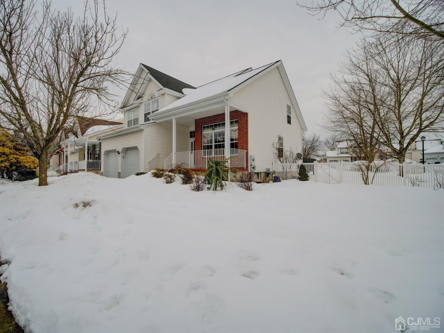 35 Springfield Road North Brunswick, NJ 08902 - Photo 2 of 42 a view of a house with a snow on the road