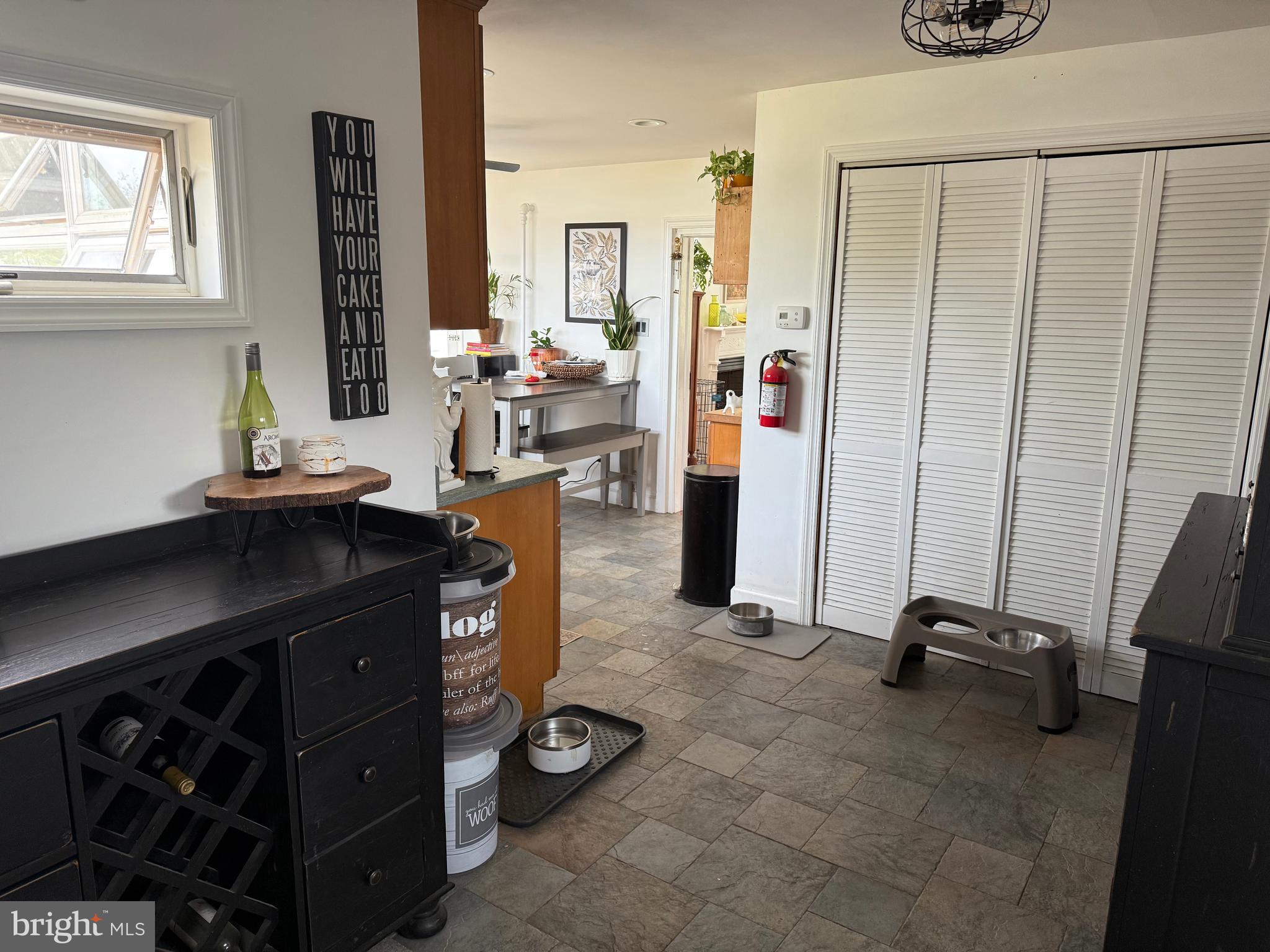 303 Baptist Road Newport, NJ 08345 - Photo 13 of 42 a room with furniture a window and gym equipment