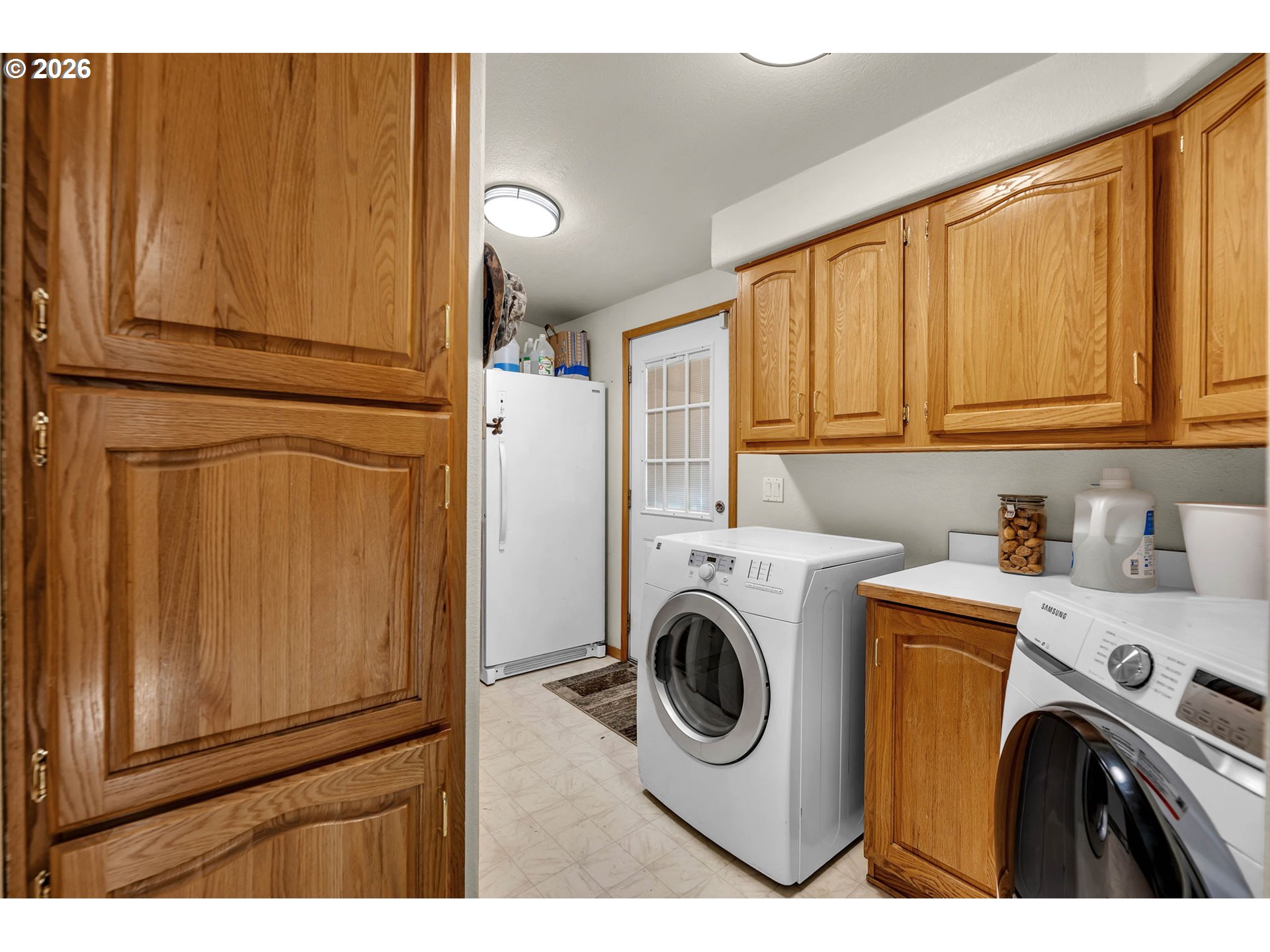 52 Estabrook Loop Carson, WA 98610 - Photo 12 of 37 a utility room with dryer and washer