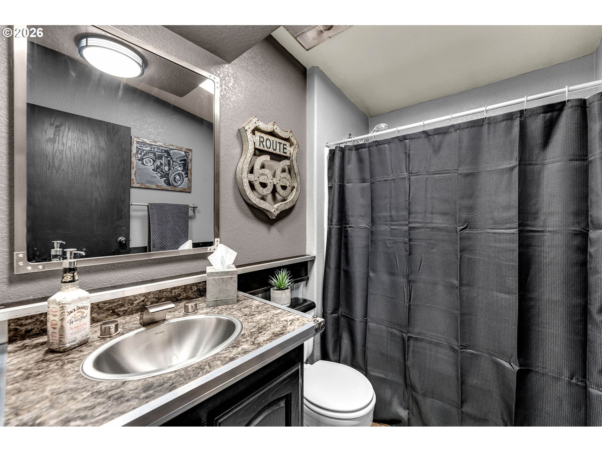 52 Estabrook Loop Carson, WA 98610 - Photo 16 of 37 a bathroom with a sink and a mirror