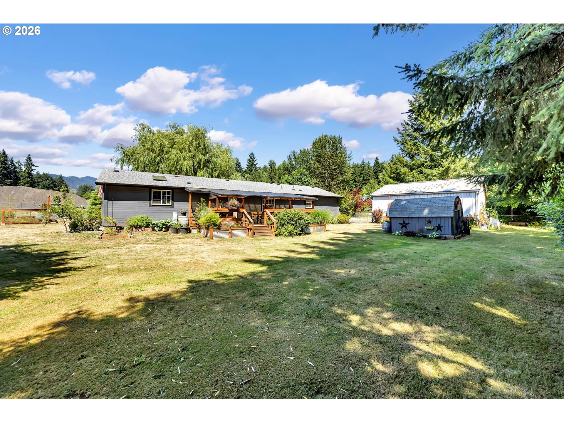 52 Estabrook Loop Carson, WA 98610 - Photo 32 of 37 a view of an house with swimming pool