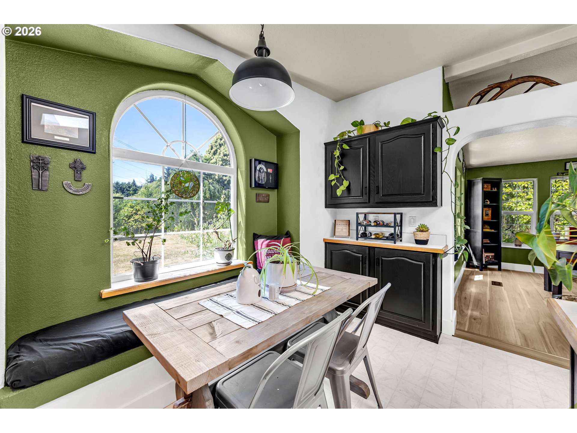 52 Estabrook Loop Carson, WA 98610 - Photo 10 of 37 a living room with furniture a flat screen tv and floor to ceiling window