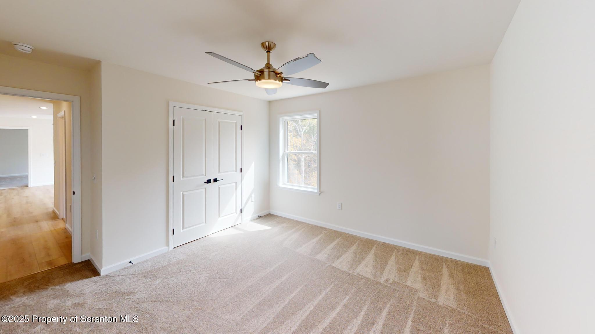 99 Woodland Drive Lake Ariel, PA 18436 - Photo 107 of 124 an empty room with windows and fan