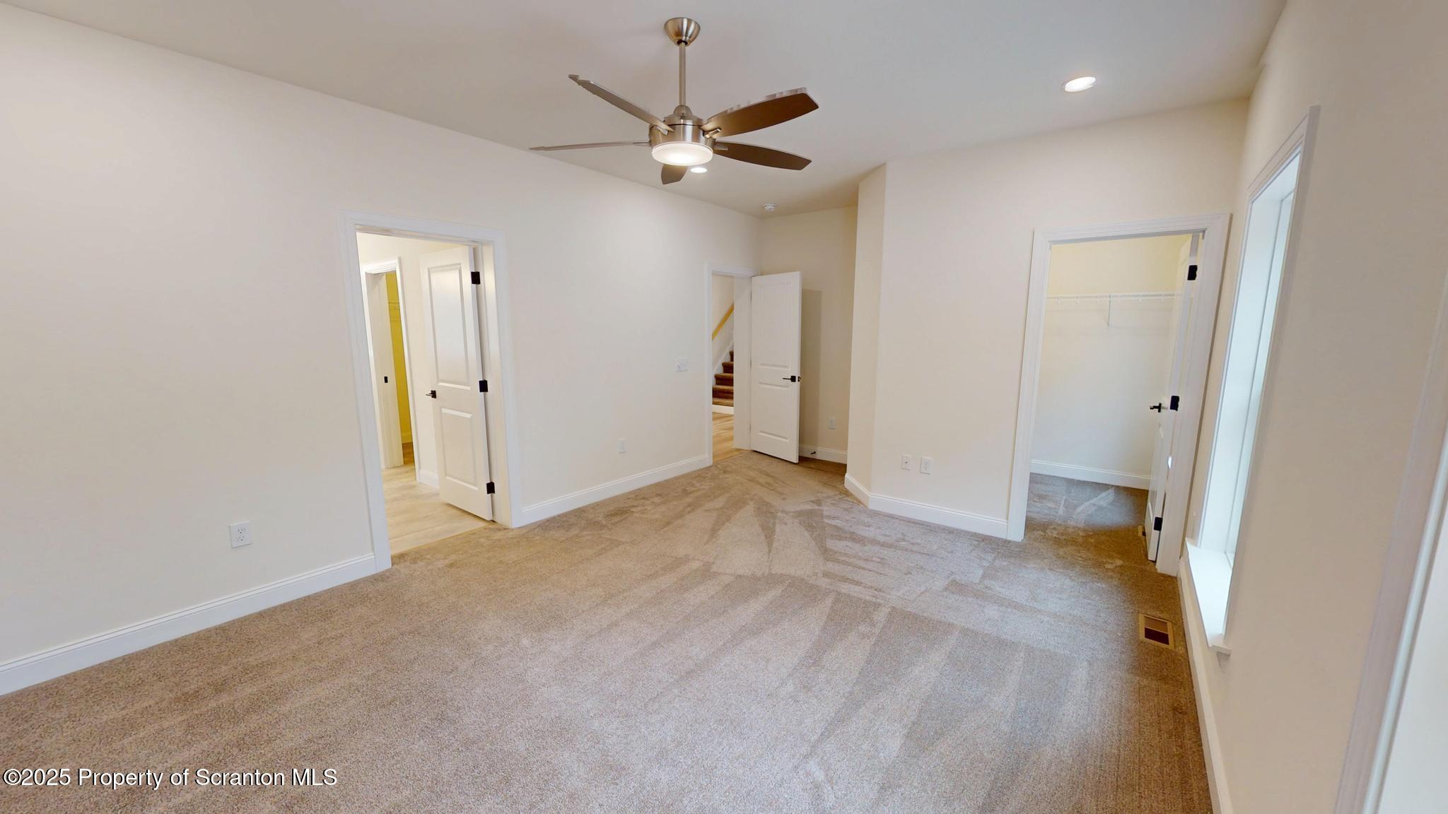 99 Woodland Drive Lake Ariel, PA 18436 - Photo 51 of 124 a view of a livingroom with a ceiling fan & a ceiling fan