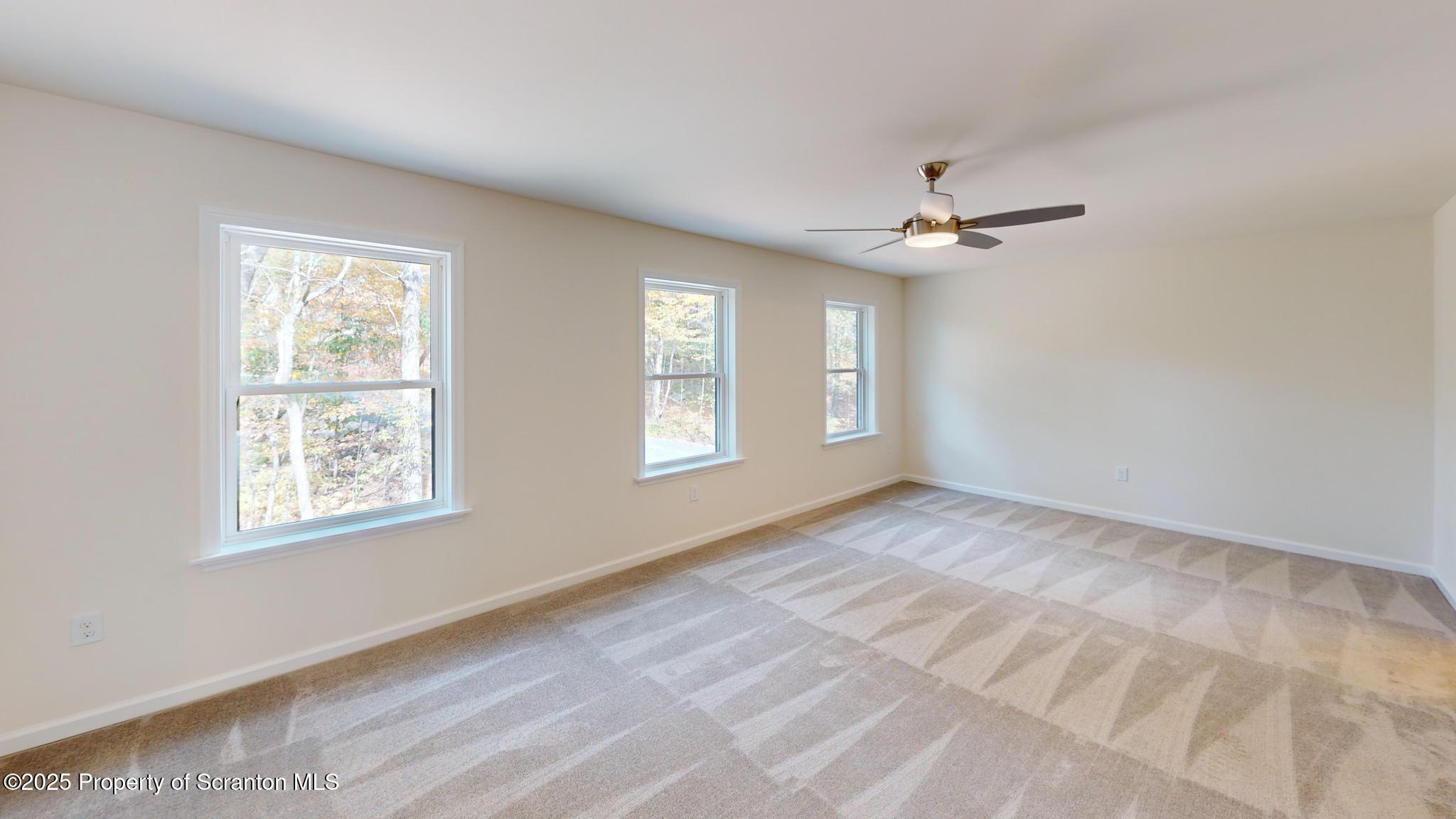 99 Woodland Drive Lake Ariel, PA 18436 - Photo 71 of 124 a view of an empty room with a window