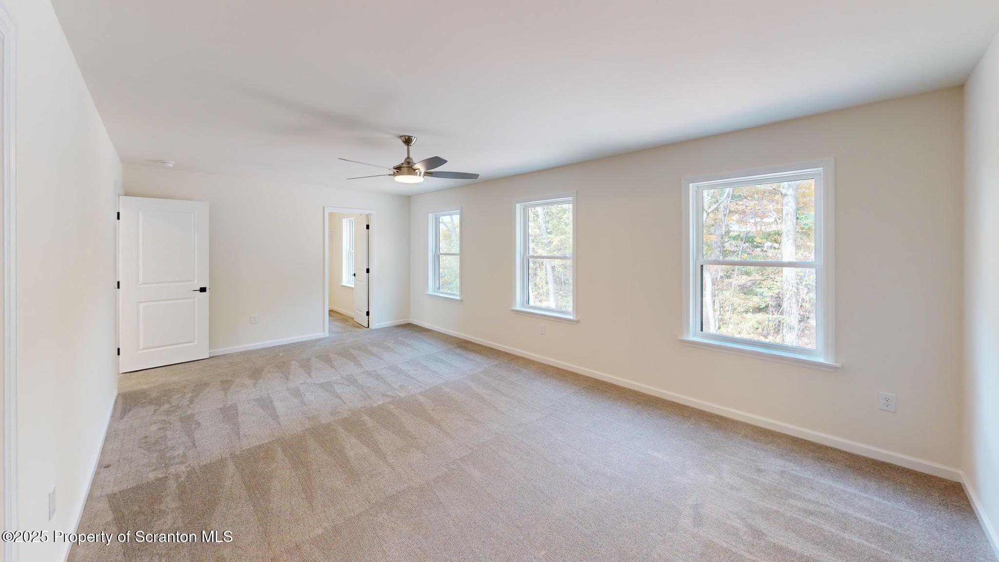 99 Woodland Drive Lake Ariel, PA 18436 - Photo 73 of 124 a view of an empty room with a window