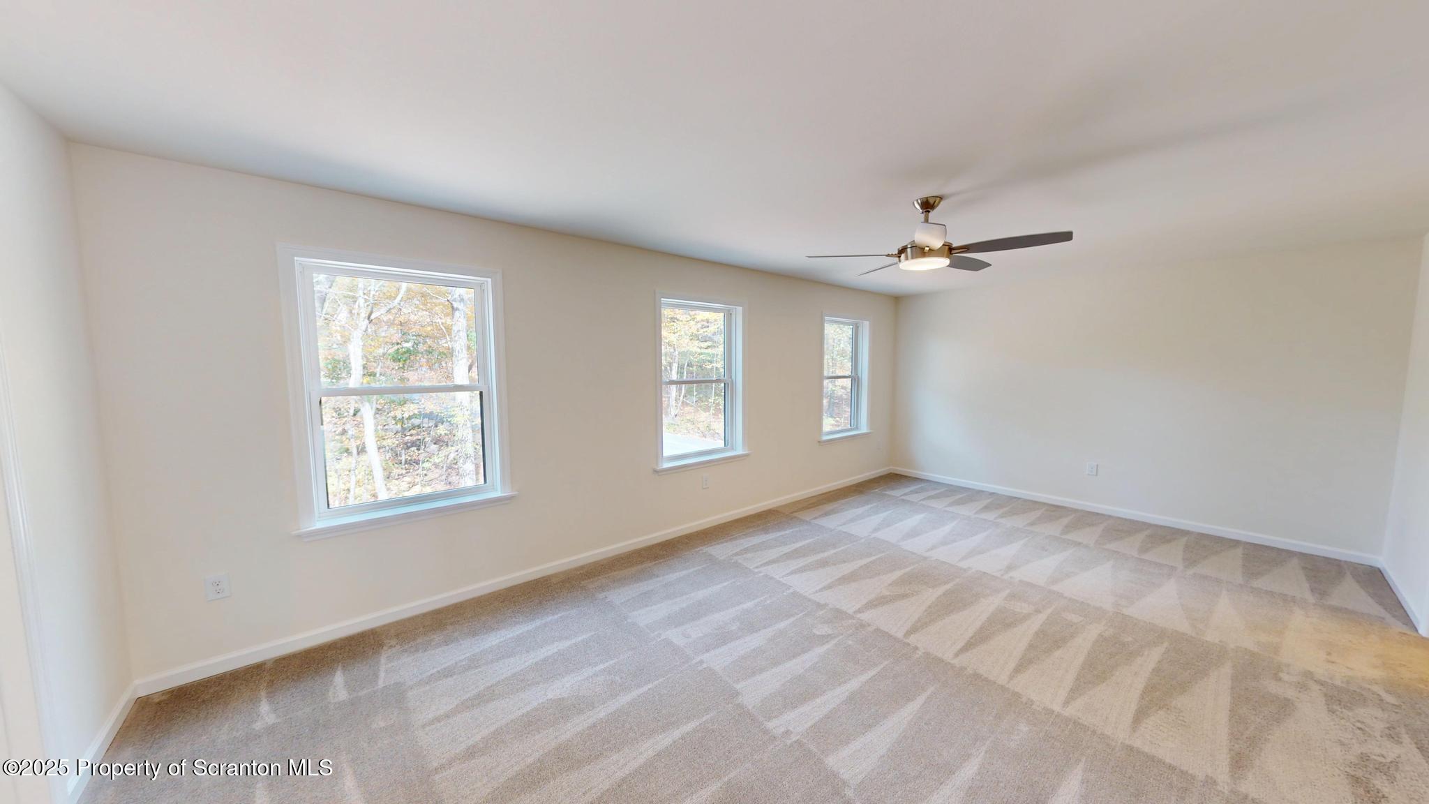 99 Woodland Drive Lake Ariel, PA 18436 - Photo 75 of 124 a view of an empty room with a window