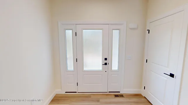 a bathroom with a sink and a window