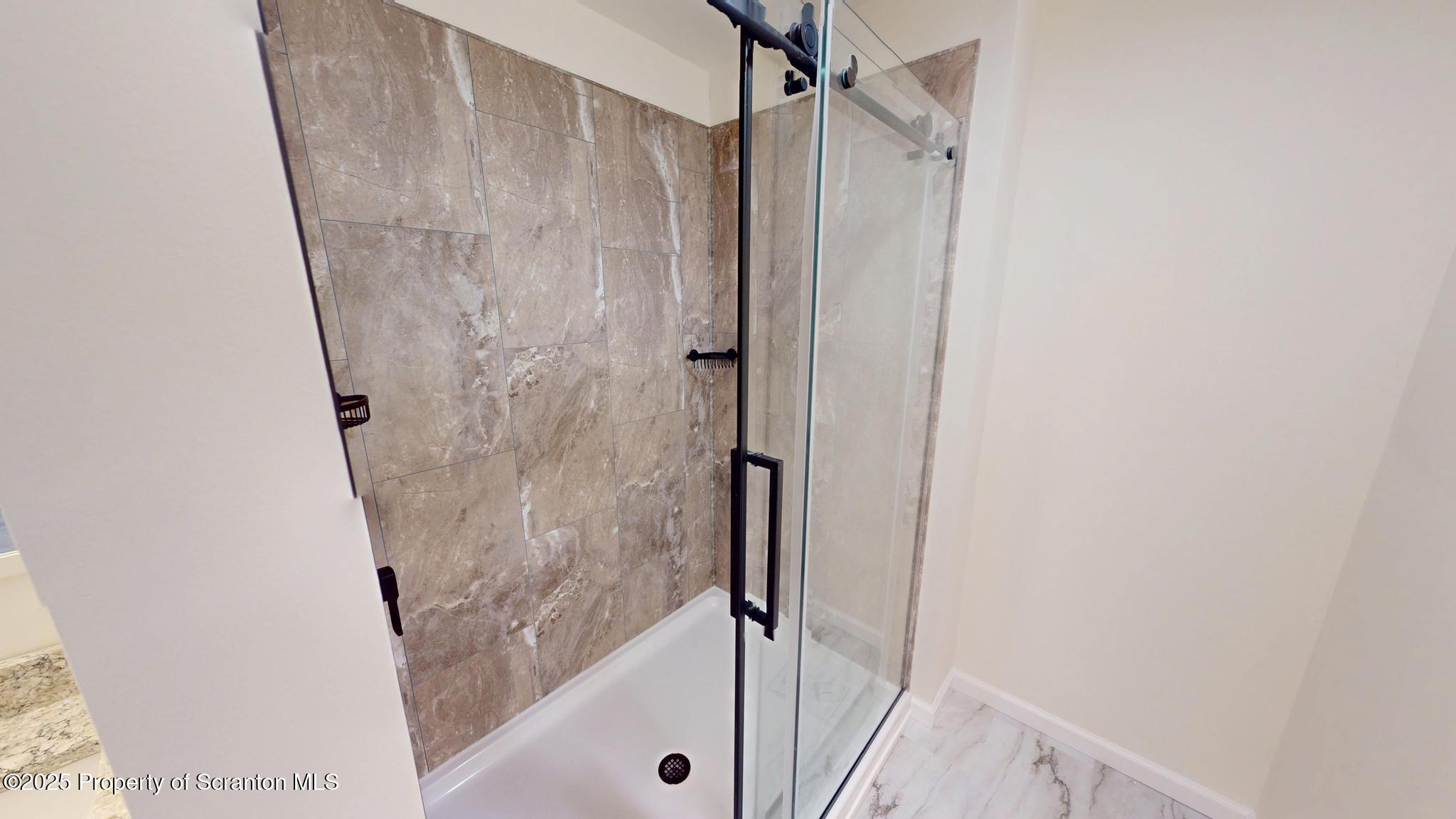 99 Woodland Drive Lake Ariel, PA 18436 - Photo 85 of 124 a bathroom with a shower and a tub