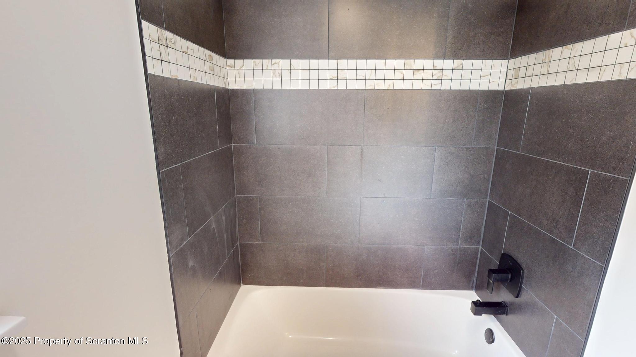 99 Woodland Drive Lake Ariel, PA 18436 - Photo 95 of 124 a bathroom with a bathtub